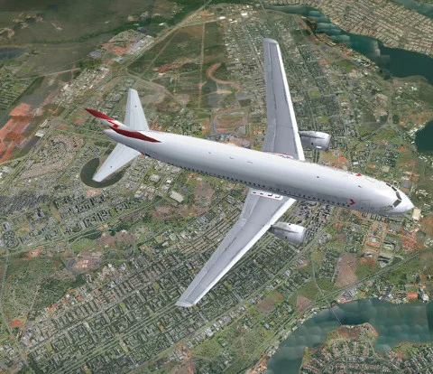 Avião sobre Brasília, projetada em formato de avião.