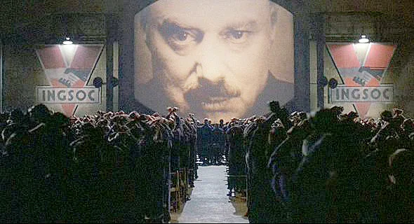 Cena do filme 1984 (dirigido por Michael Radford), onde ocorre a exaltação ao Grande Irmão (ou "Big Brother")