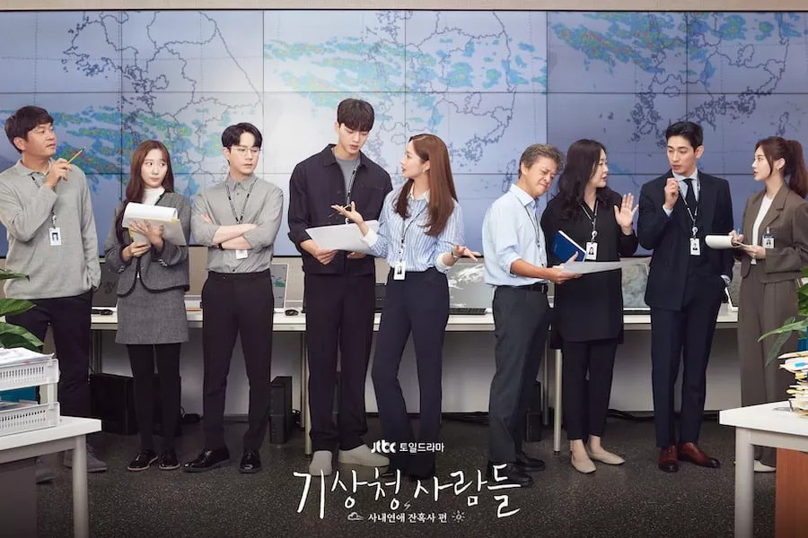 Personagens do escritório central de Seul (a partir da esquerda): Uhm Dong Wan, Kim Soo Jin, Shin Seok ho, Lee Shi Woo, Jin Ha Kyung, chefe, Oh Myung Joo, Han Ki Joon, Chae Yoo Jin. Créditos: JTBC